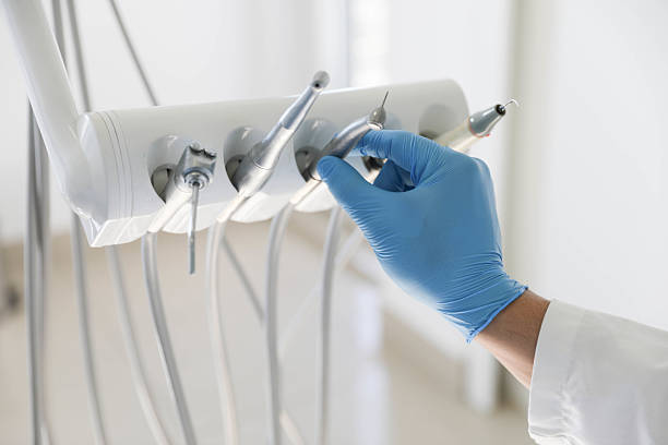 Professional Invisalign Clear Aligners technician working in Denison, TX